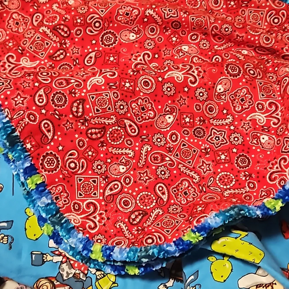 Handmade cowboy baby blanket with embroidered edges 42